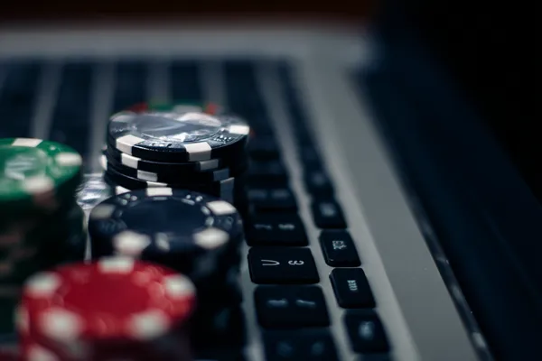 ZBZBET Jackpot Slots — Spin for massive rewards A dramatic shot of winning sevens landing on a slot reel surrounded by shining gold coins, symbolizing big wins.